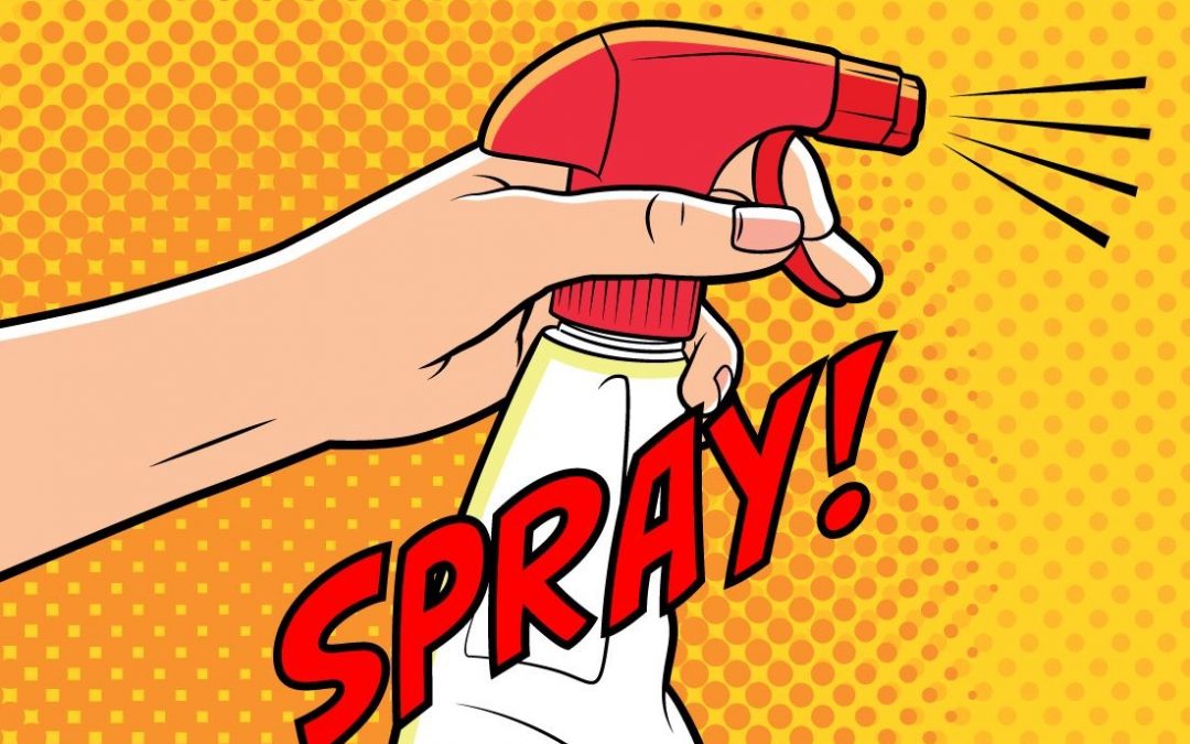 A spray bottle spraying.